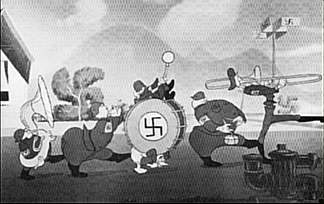 Una banda militar de m&uacute;sica en la Alemania nazi. N&oacute;tese la veleta, el &aacute;rbol y la toma de agua con forma de esv&aacute;stica